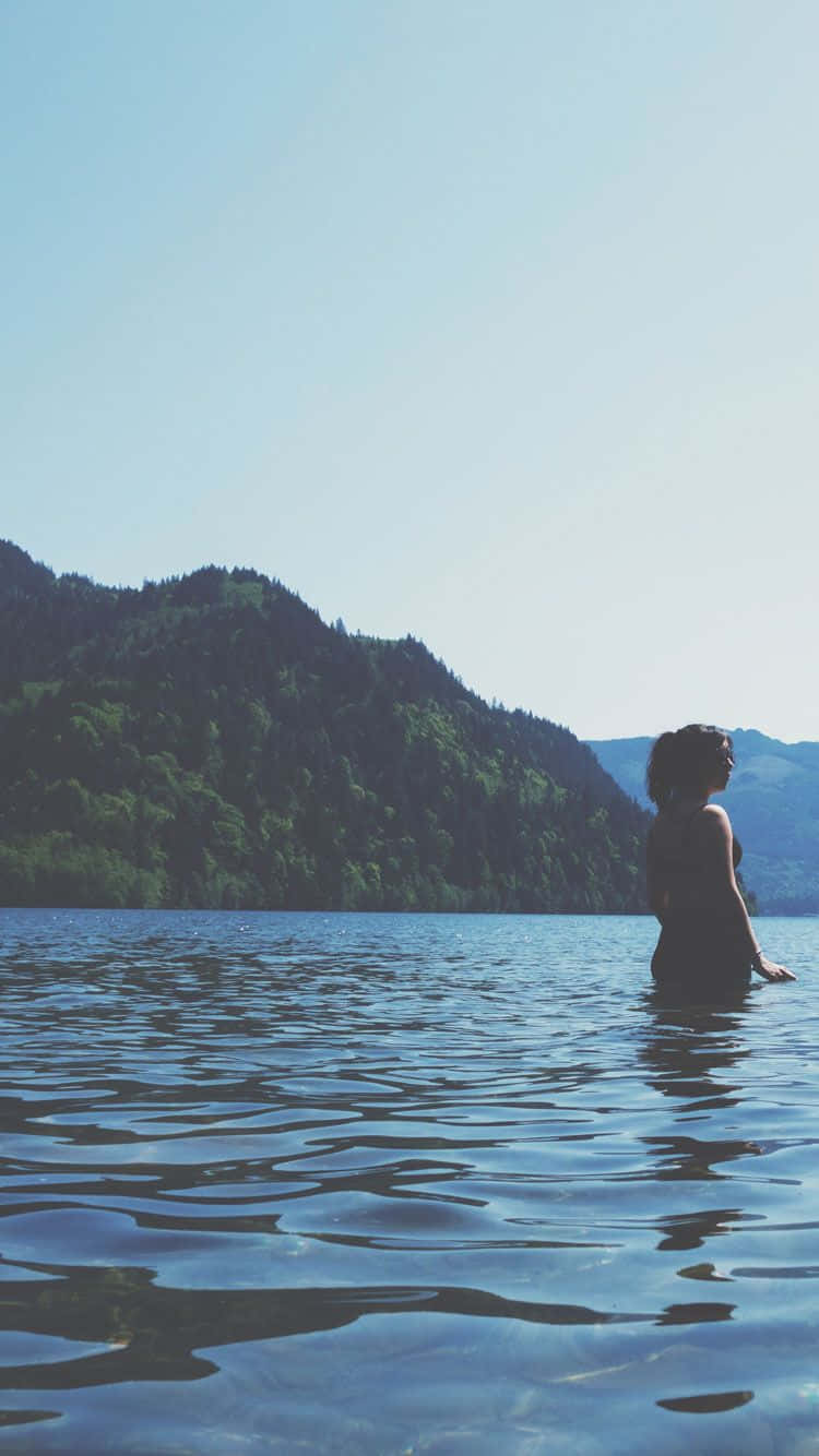 Summer Time Iphone With Woman During Vacation Background