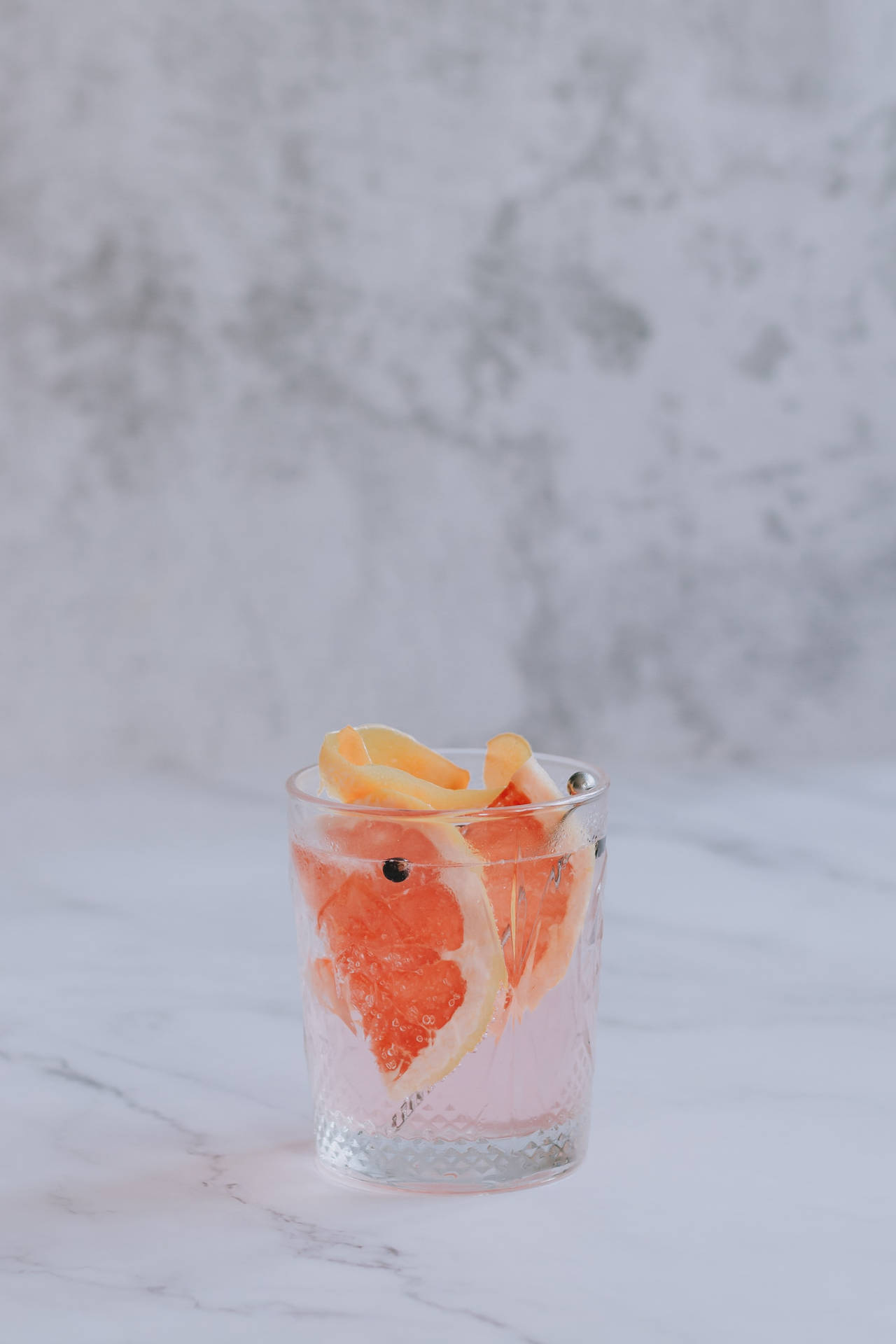 Summertime Scenery With Gin Infused Fruit Cocktail Background