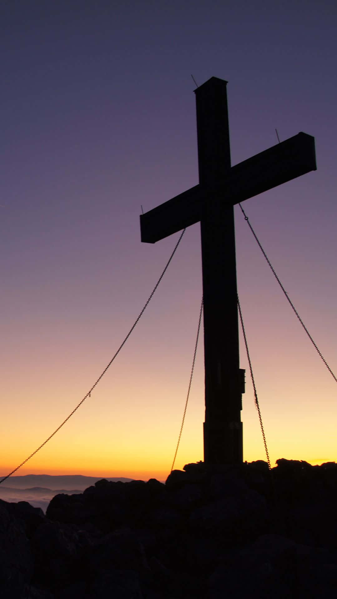 Summit Beautiful Cross With Purple Sunset Sky