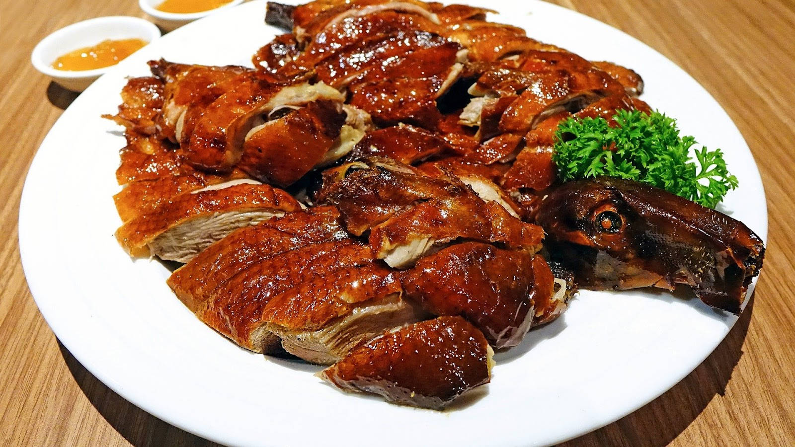 Sumptuous Roasted Peking Duck On A Plate Background