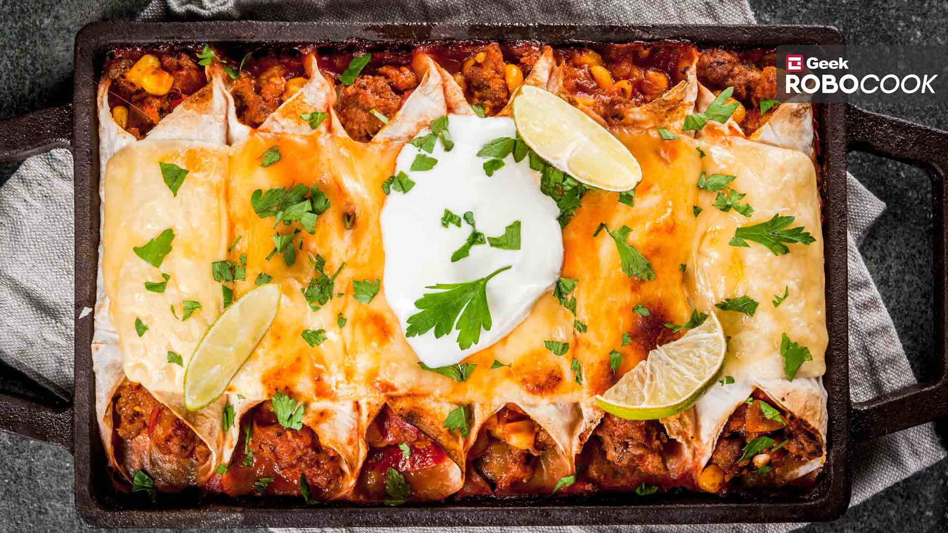 Sumptuous Tray Of Enchiladas Garnished With Fresh Limes Background