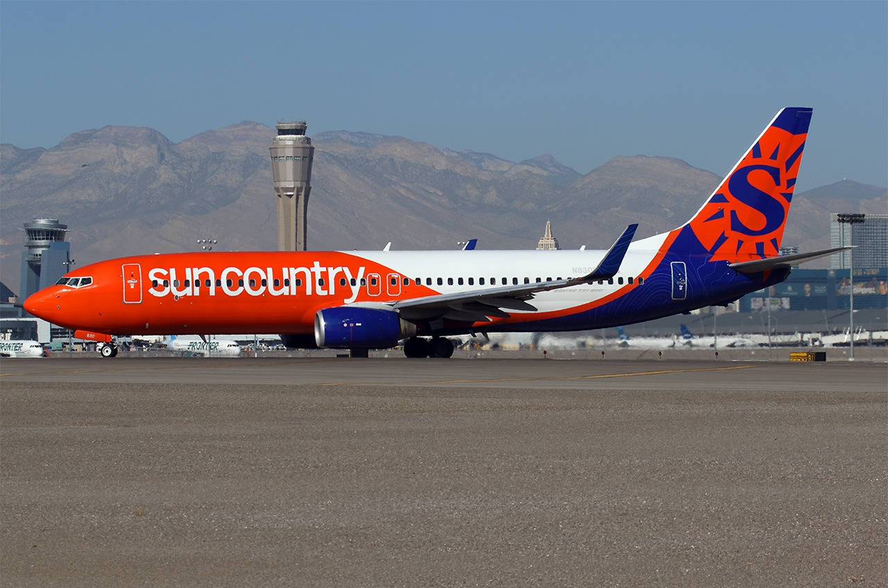 Sun Country Aircraft In Las Vegas Airport Background