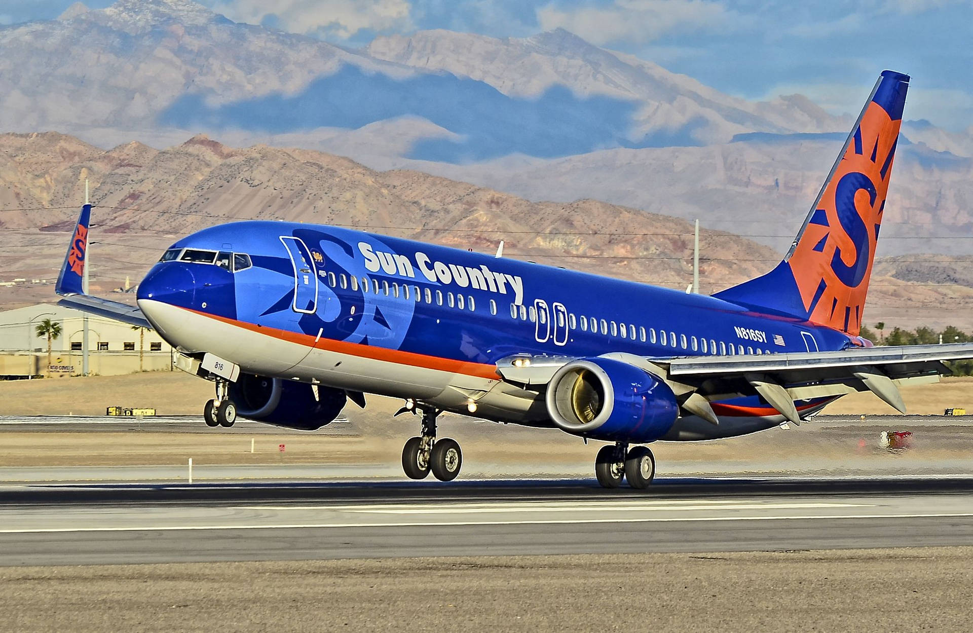 Sun Country In Tuscon International Airport Background