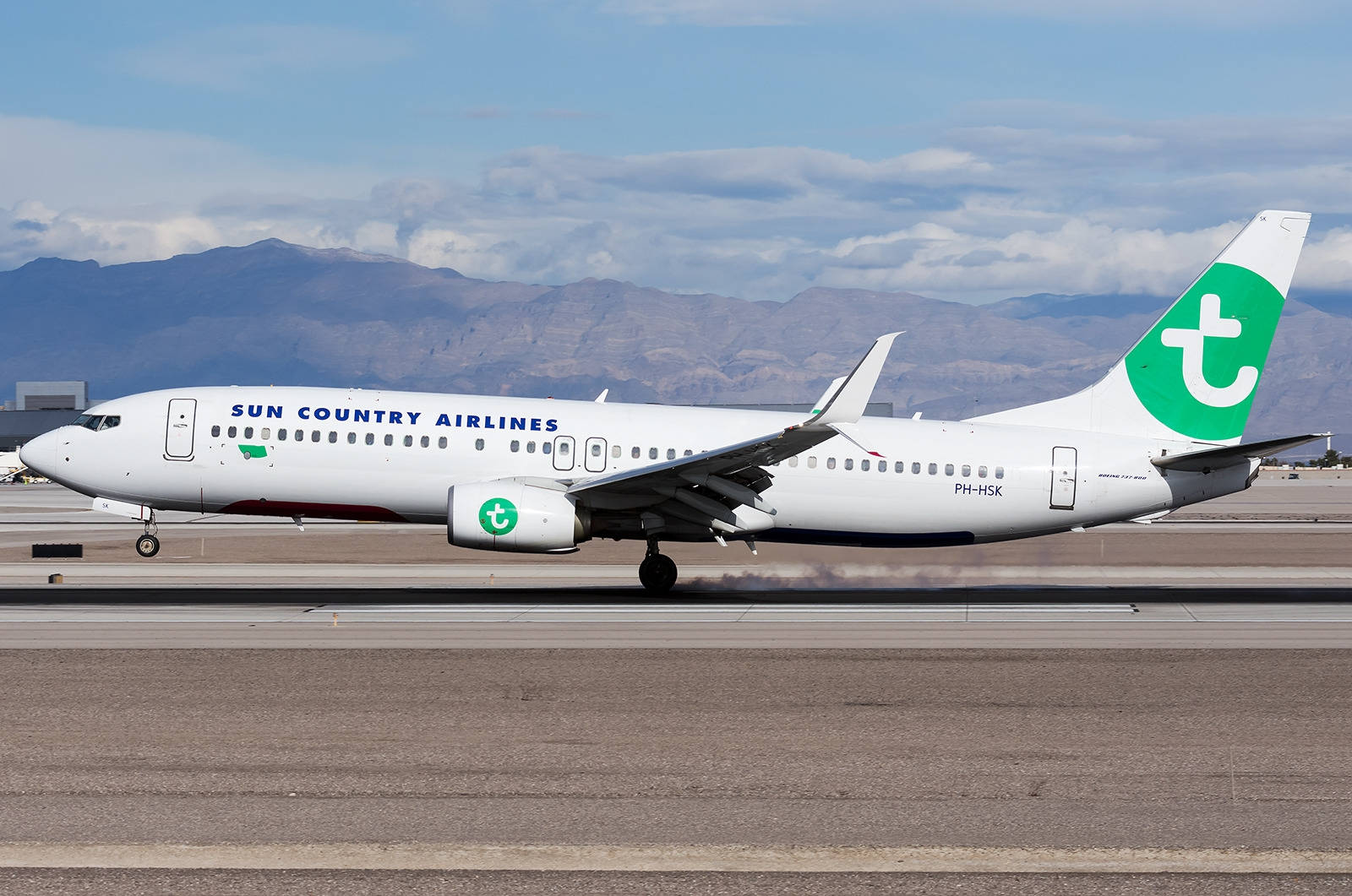 Sun Country White Aircraft On Transavia Background