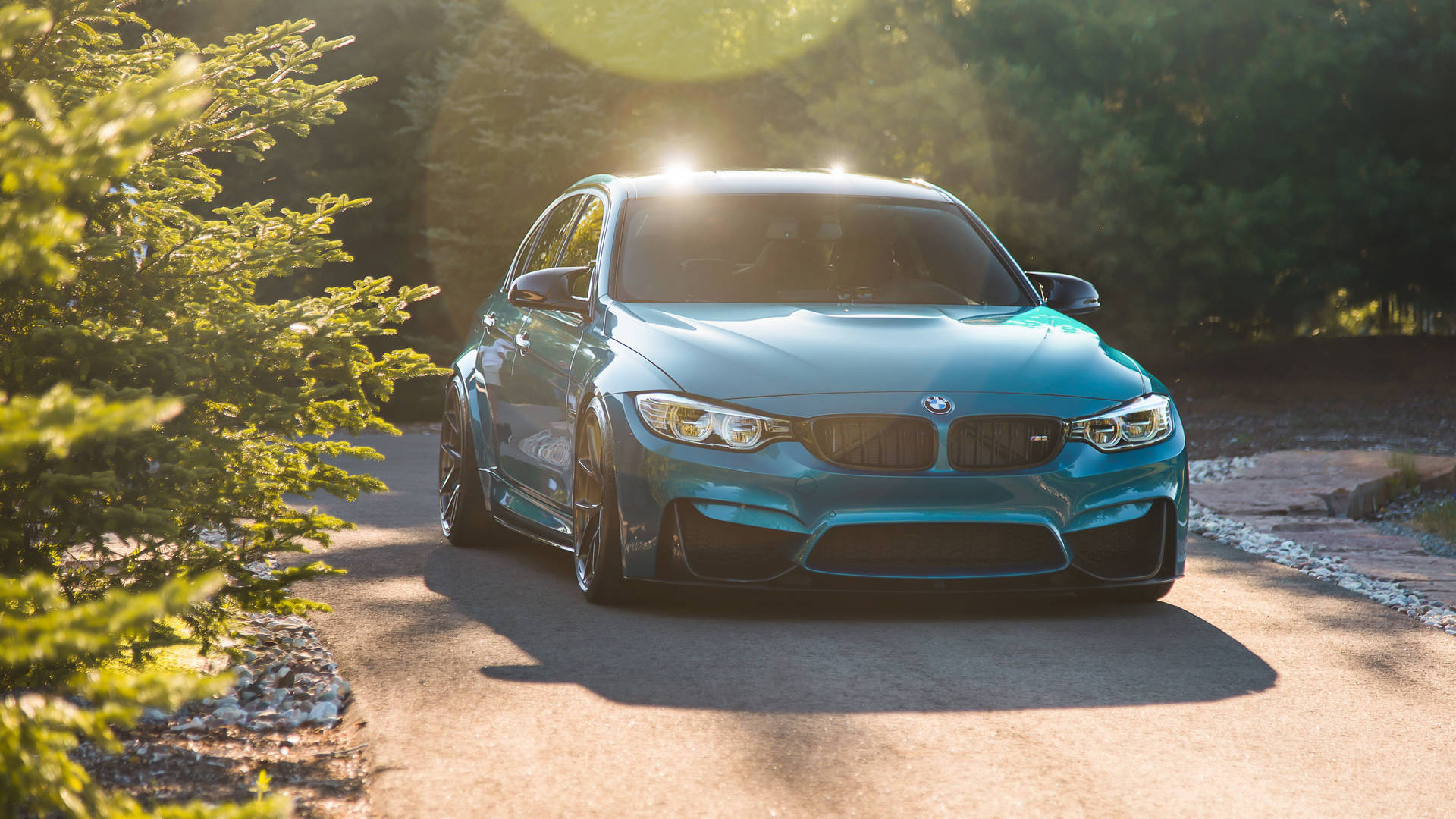 Sun Glowing On Blue Bmw Background