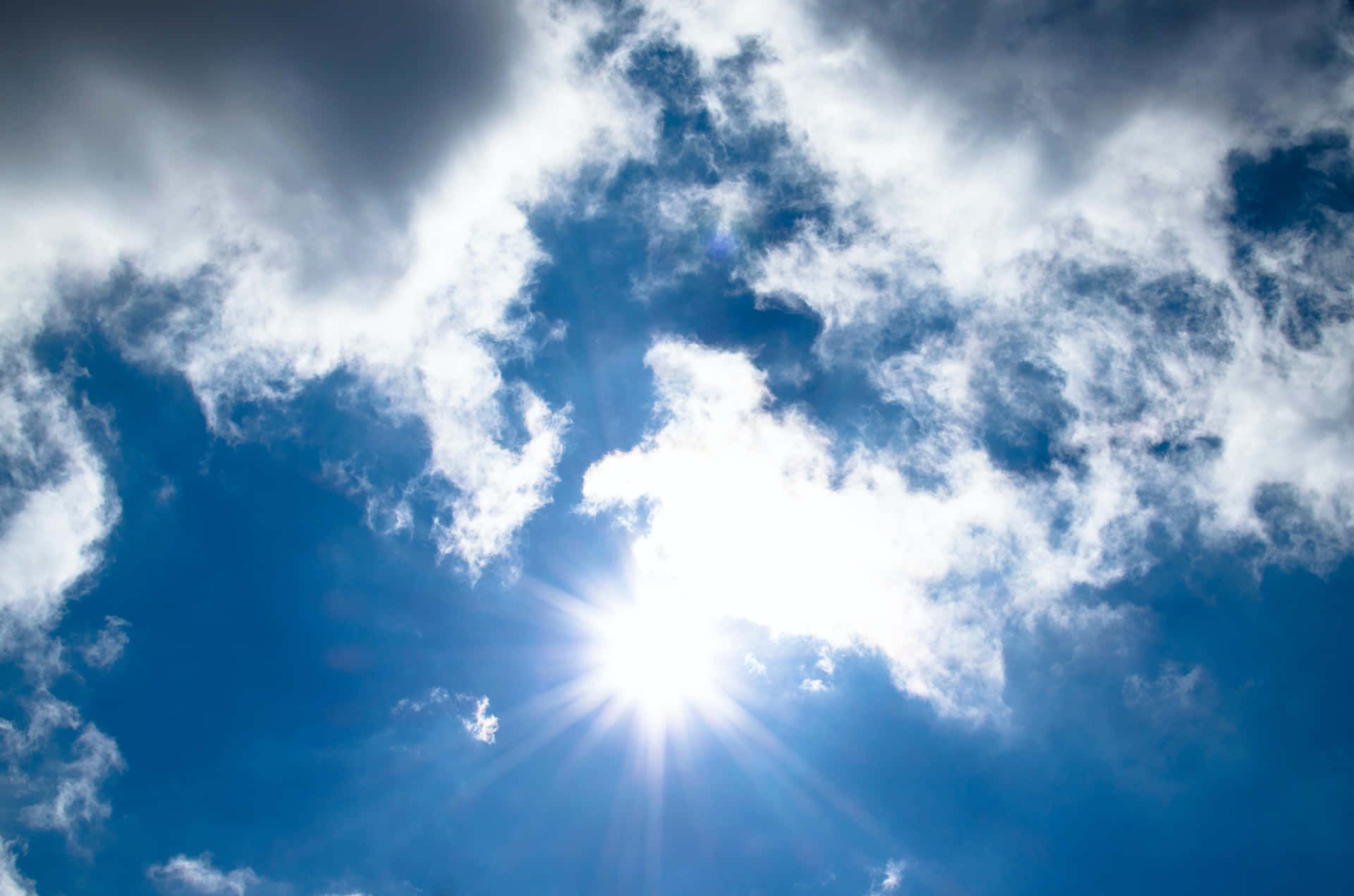 Sunburst Through Clouds Sky Background