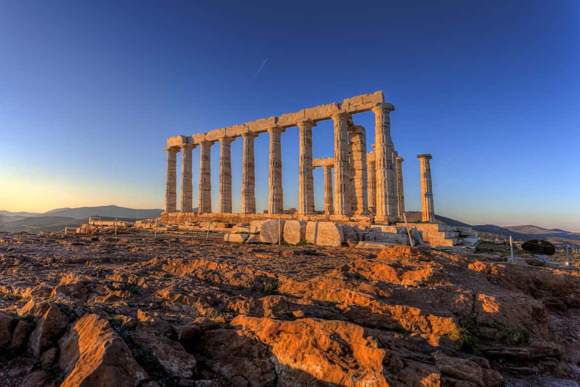 Sundown At Temple Of Poseidon Background