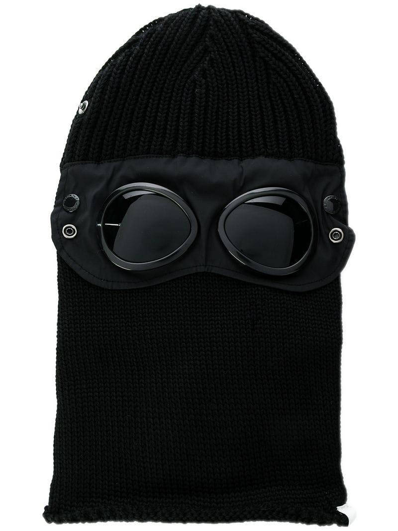 Sunglasses Over Black Ski Mask Background