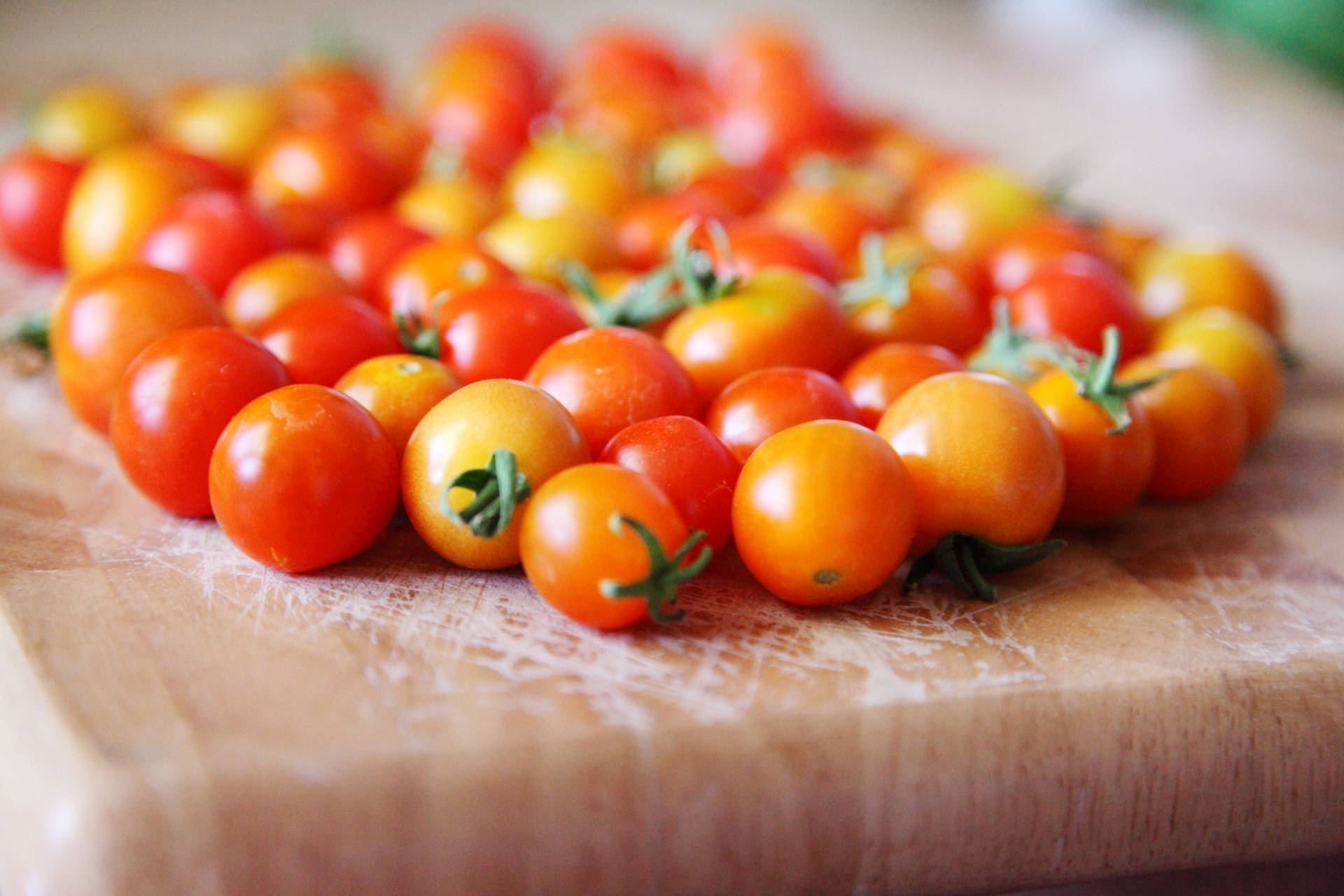 Sungold Tomato Fruits On Wooden Table Background