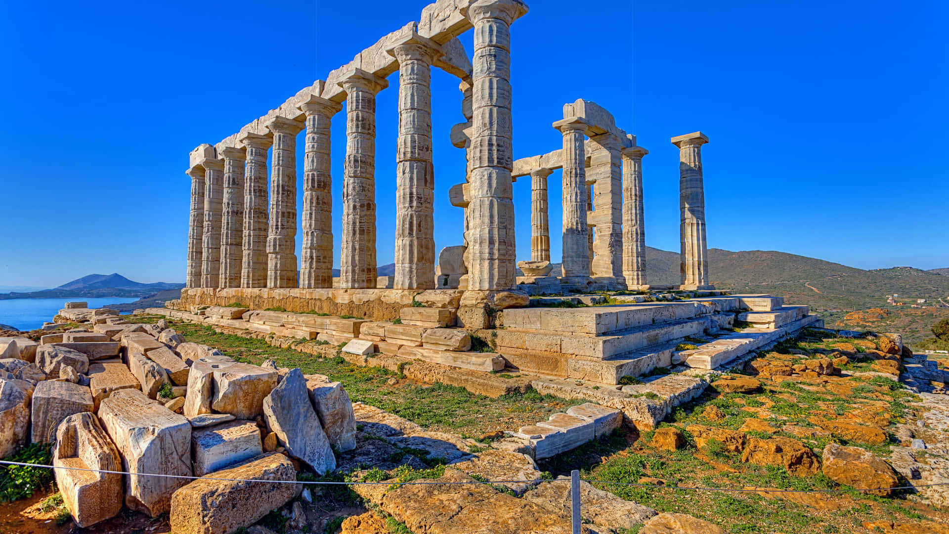 Sunlight At Temple Of Poseidon Background