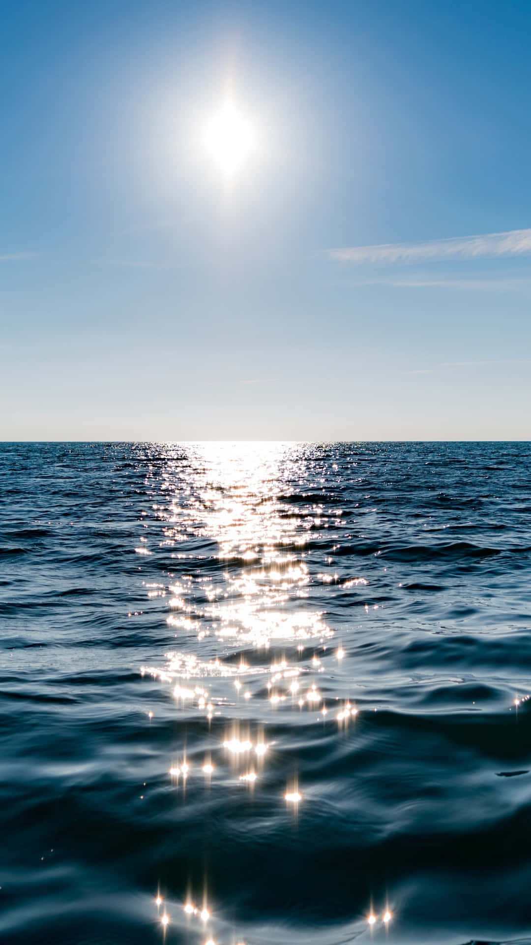 Sunlight Reflections Over Ocean Background