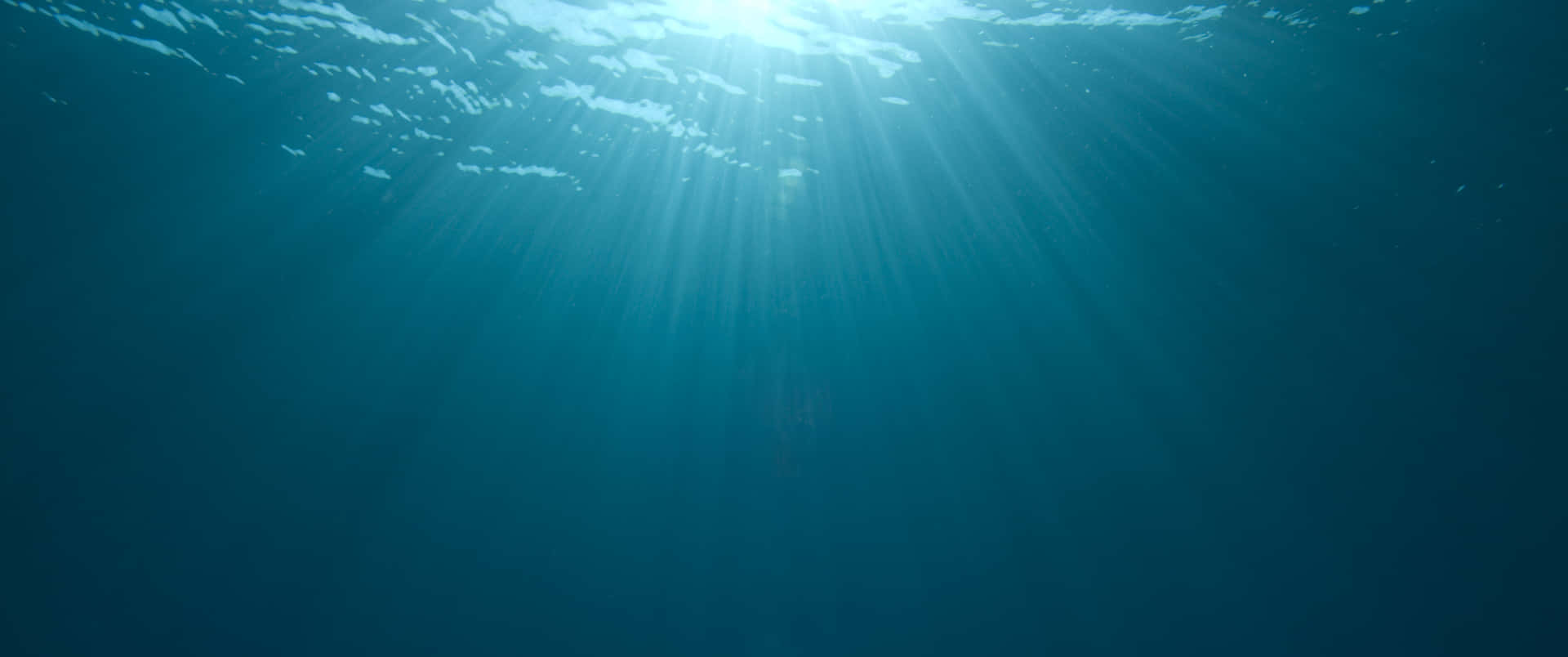 Sunlight Underwater Blue Ocean Wide Background