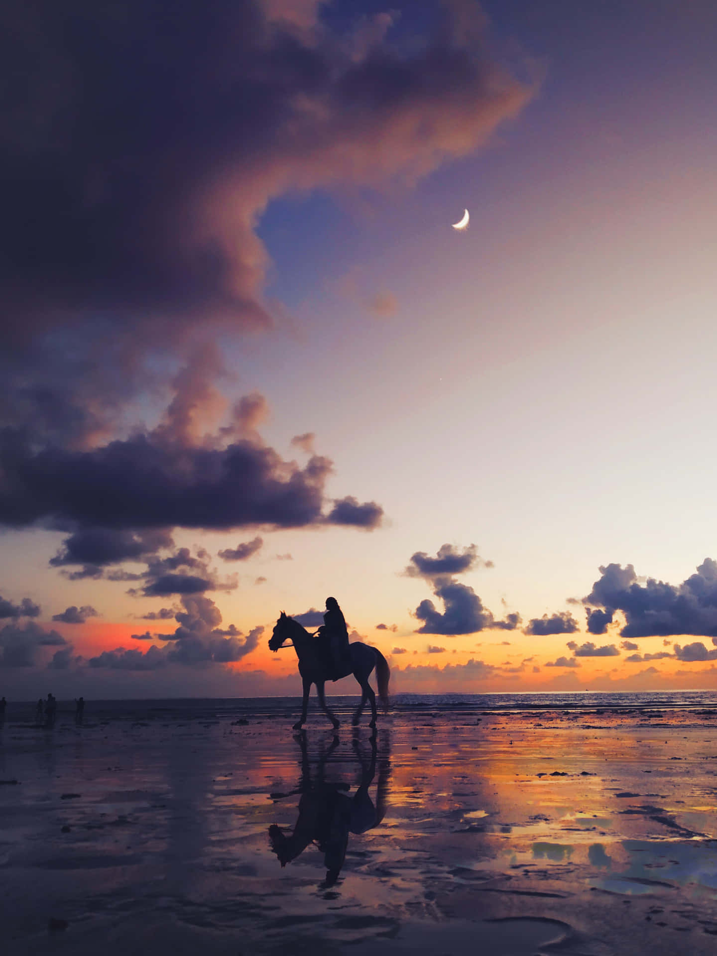 Sunlit Beach And Brightly-colored Sky Background