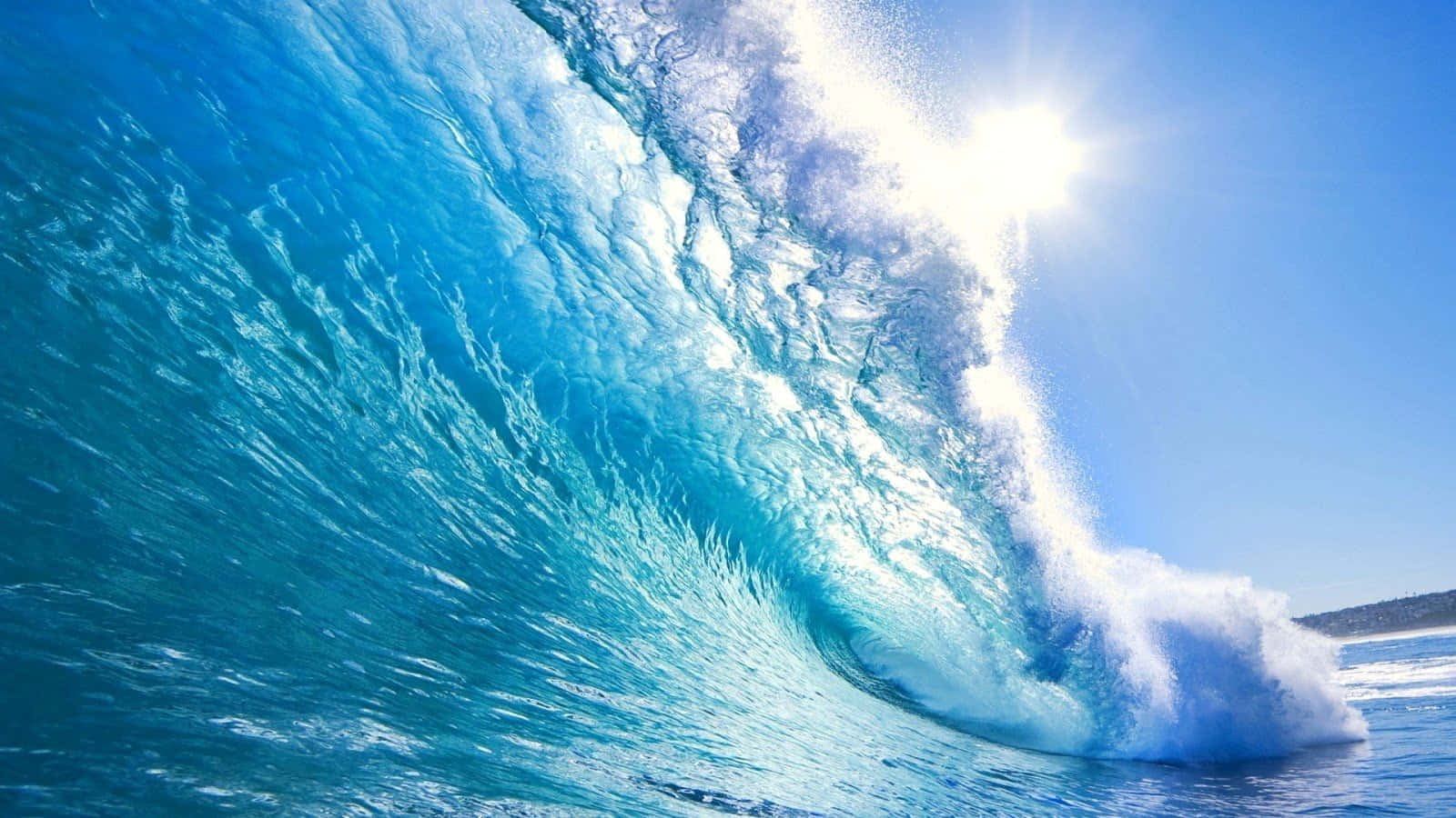 Sunlit Ocean Wave Background