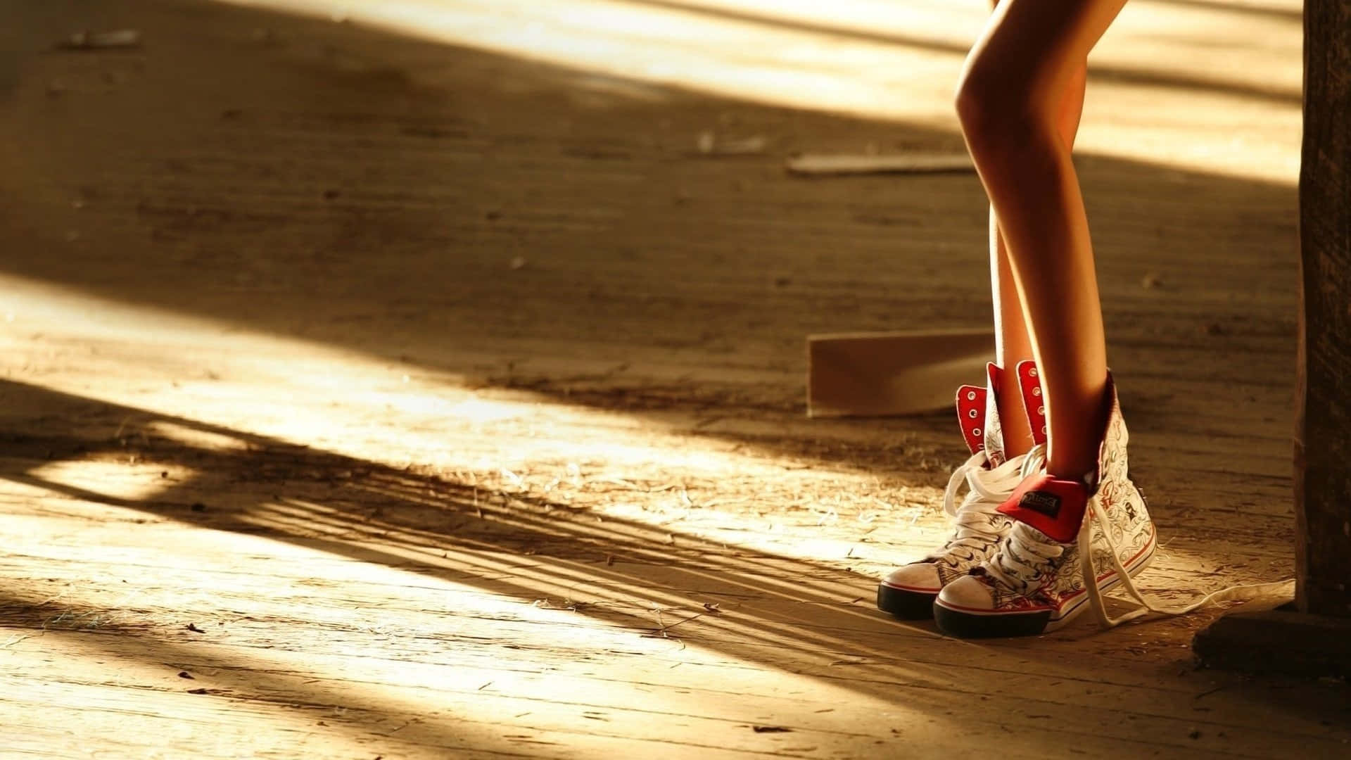 Sunlit Sneakersand Legs Background