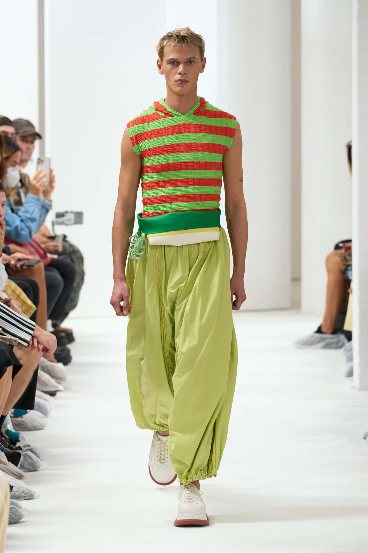 Sunnei Striped Top And Yellow-green Pants Background