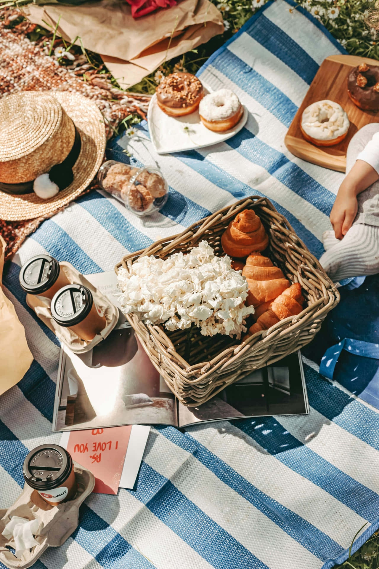 Sunny Picnic Scenewith Foodand Flowers.jpg Background