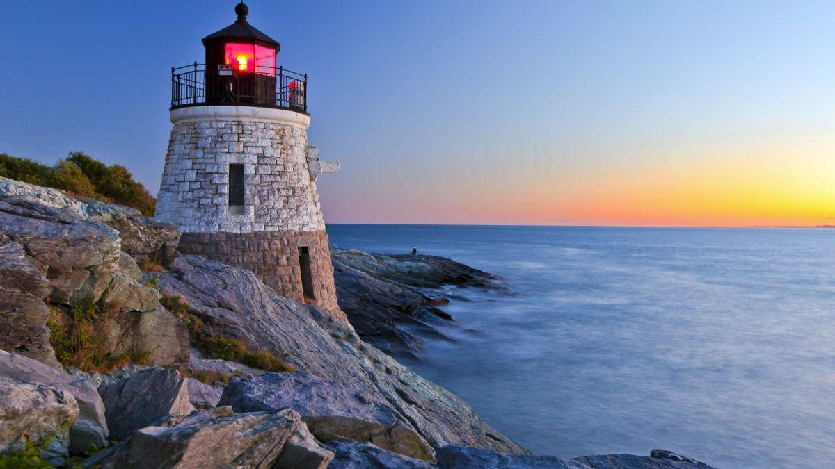 Sunrise At Castle Hill Lighthouse In Rhode Island Background