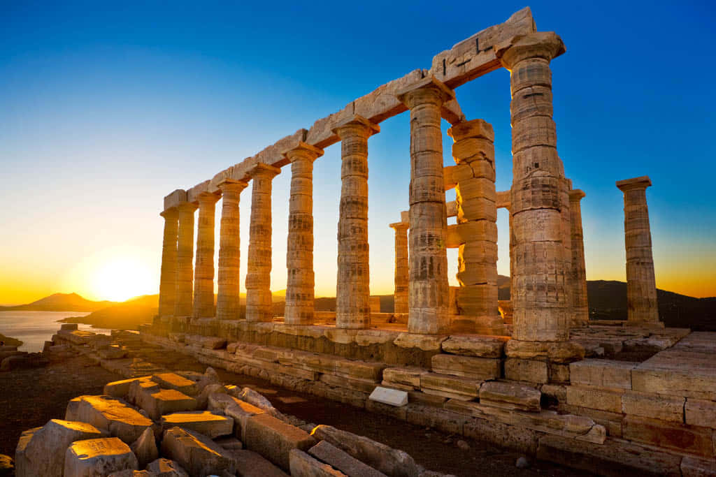 Sunrise At The Temple Of Poseidon Background