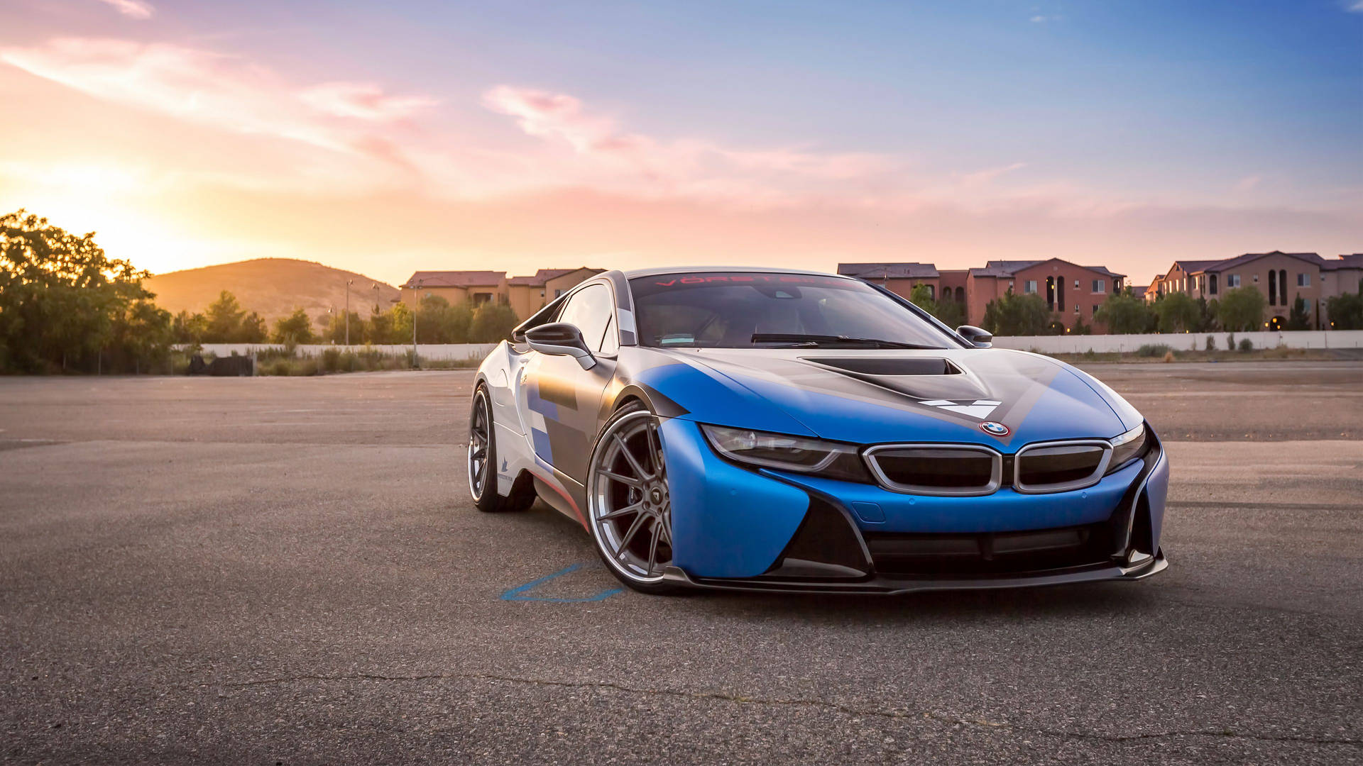 Sunrise Behind A Blue Bmw