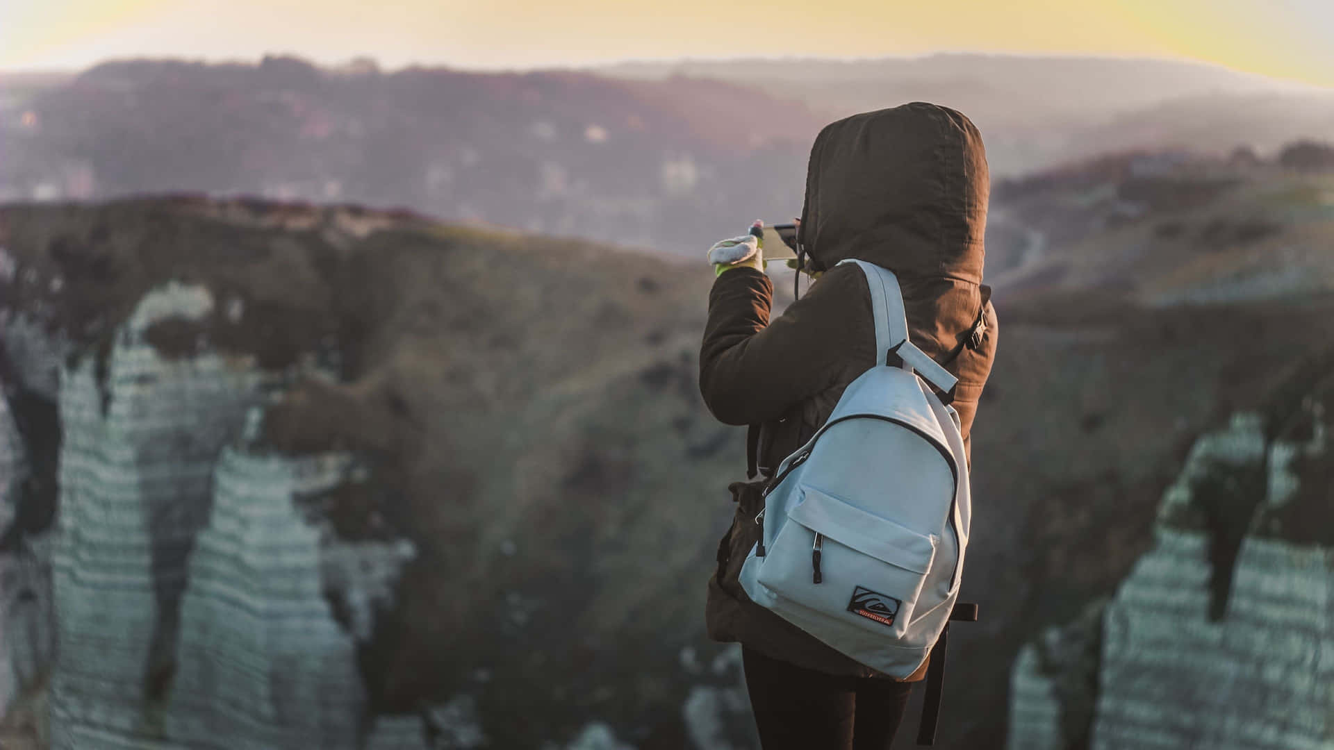 Sunrise Hiker Capturing Moment.jpg Background