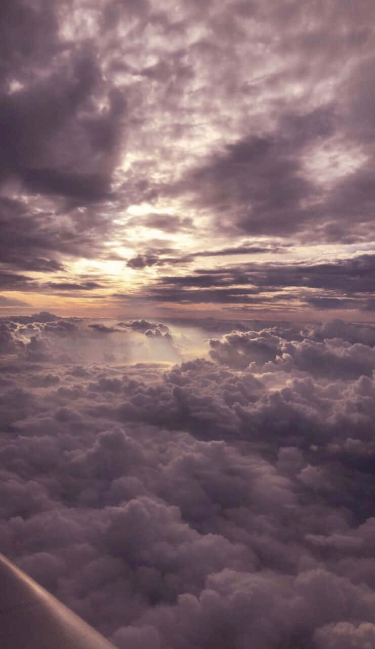 Sunset_ Above_ Clouds_ Aerial_ View