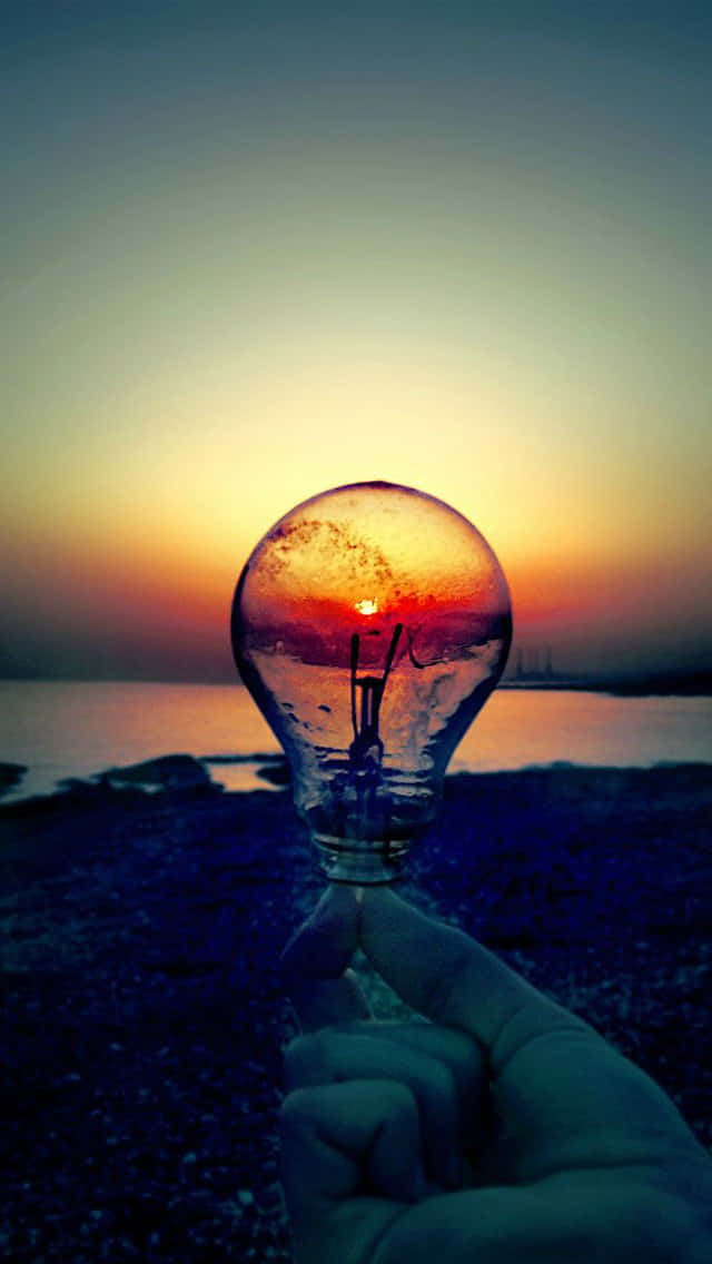 Sunset Behind Incandescent Bulb