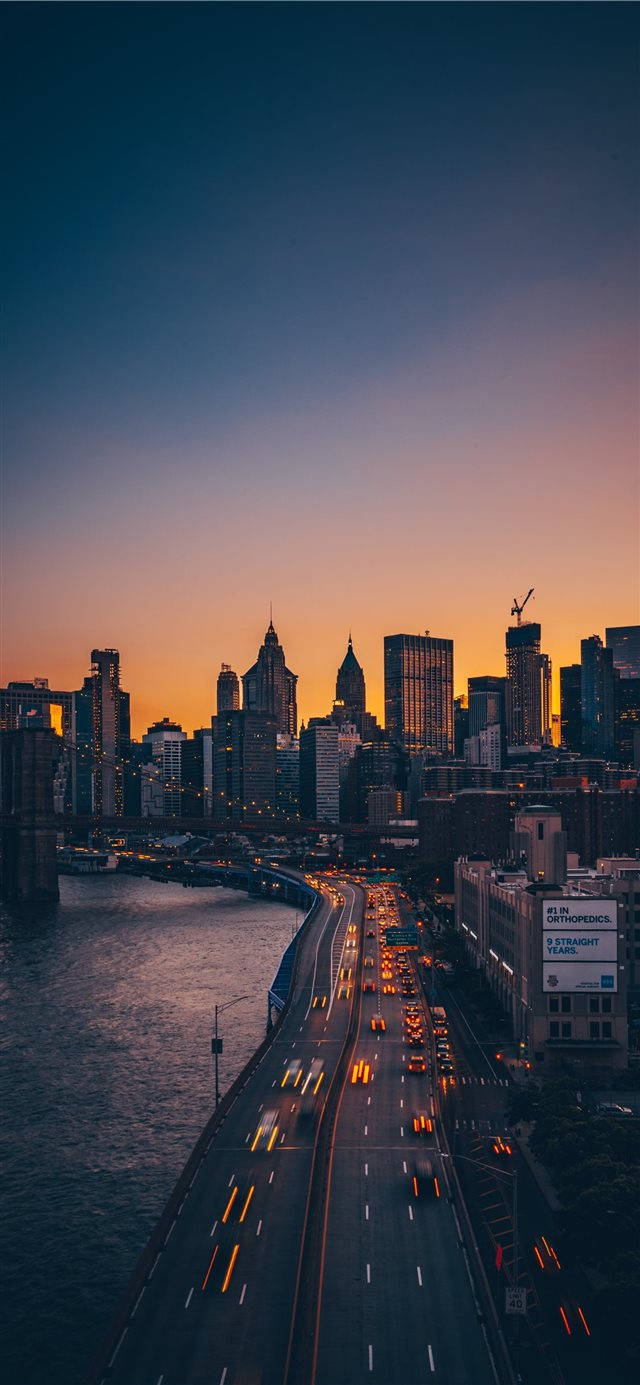 Sunset Cityscape Iphone Ios 10 Background