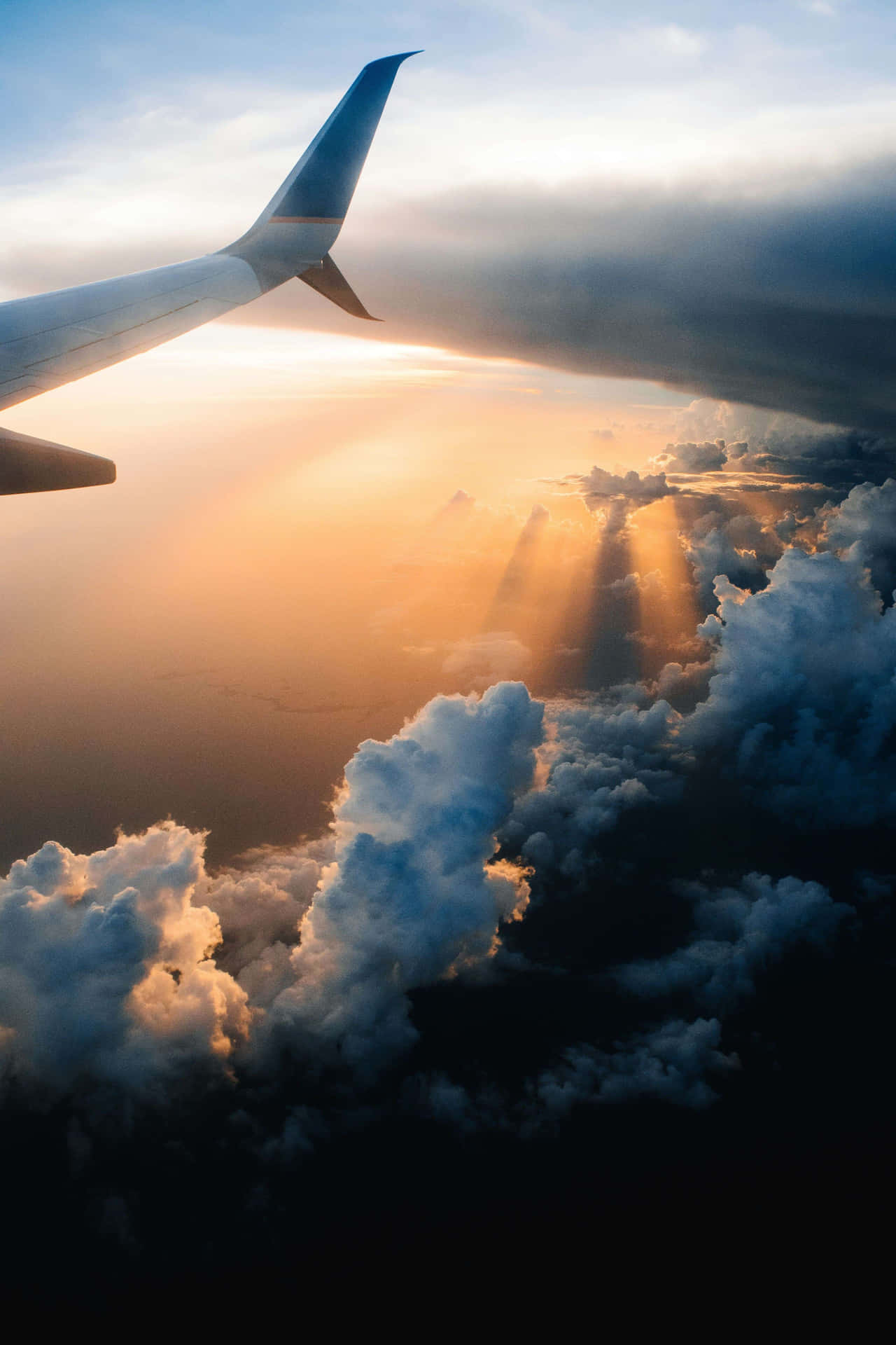 Sunset_ Cloudscape_ Airplane_ Wing_ View Background