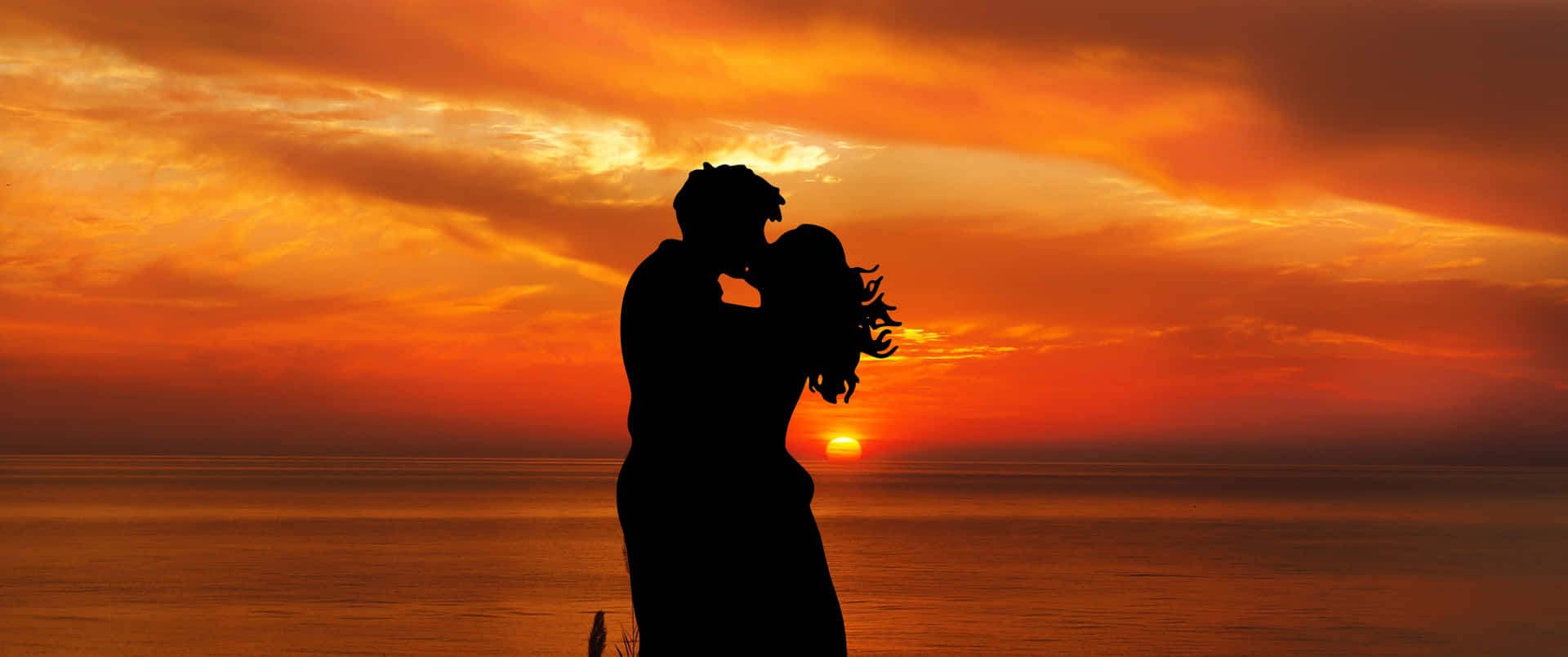 Sunset Couple Kiss