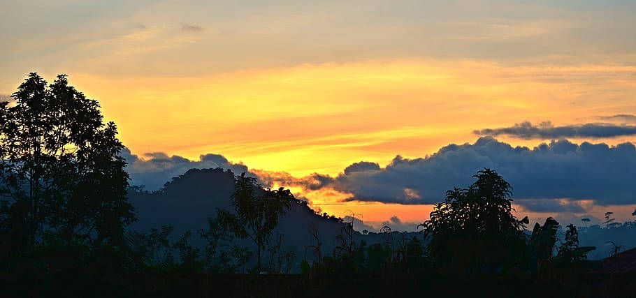 Sunset In The Mountains Of Yaoundé Cameroon Background