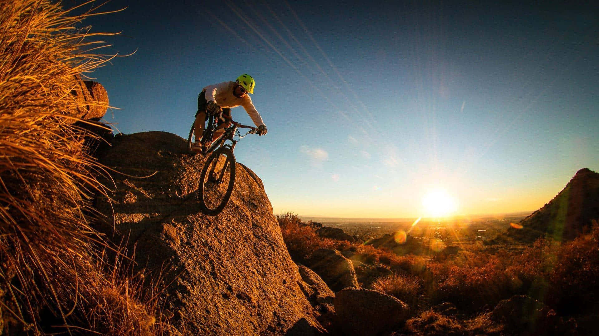 Sunset Mountain Biking Adventure Background