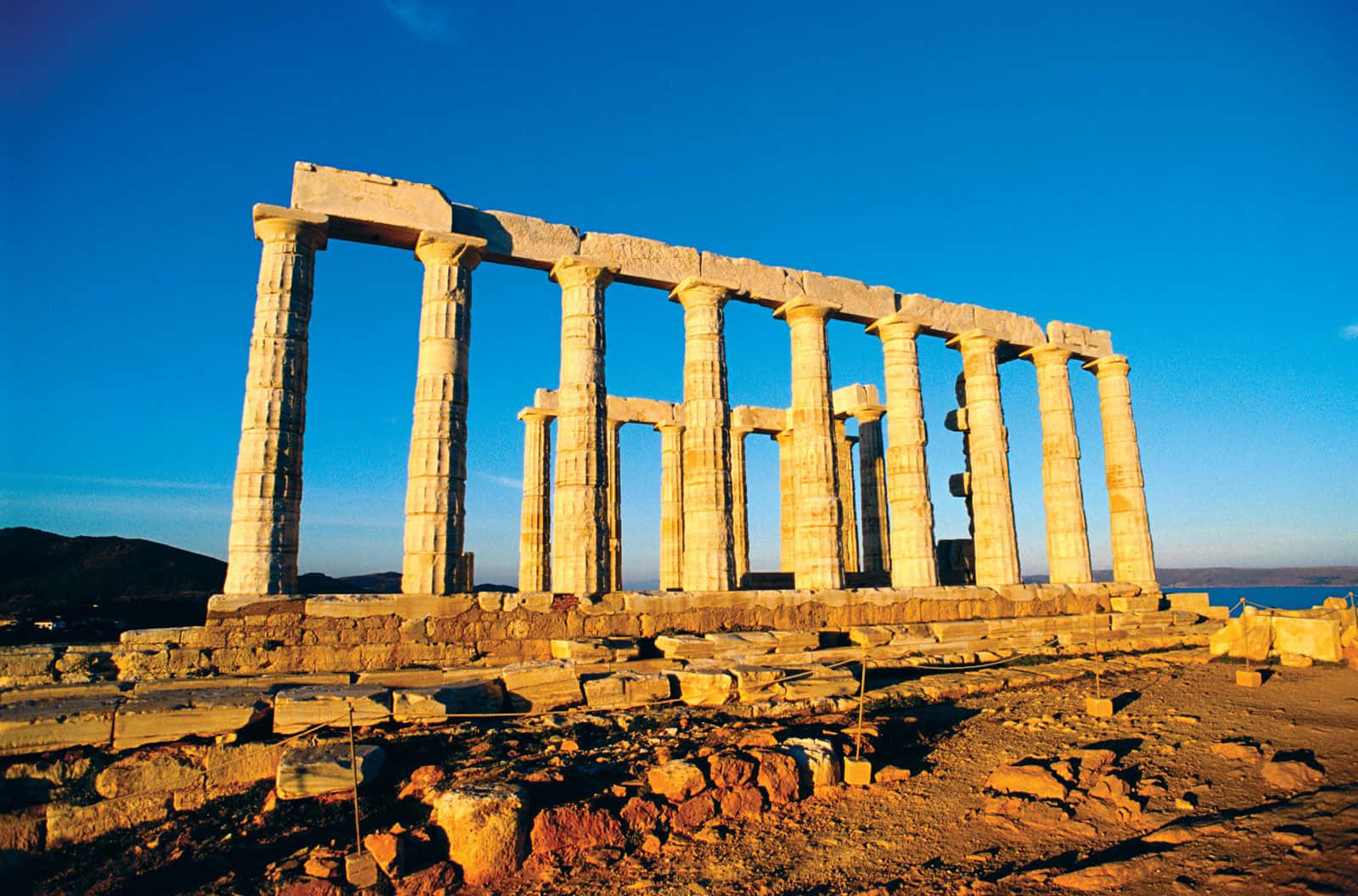 Sunset Reflection At Temple Of Poseidon Background