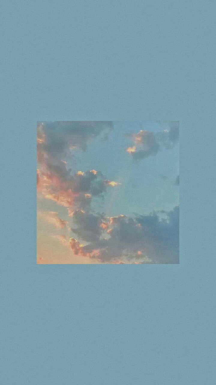 Sunset Sky On Pastel Blue Solid Background