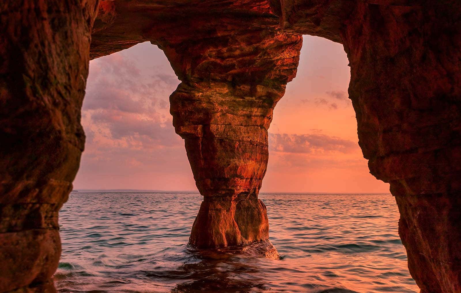 Sunset View Through Sea Cave