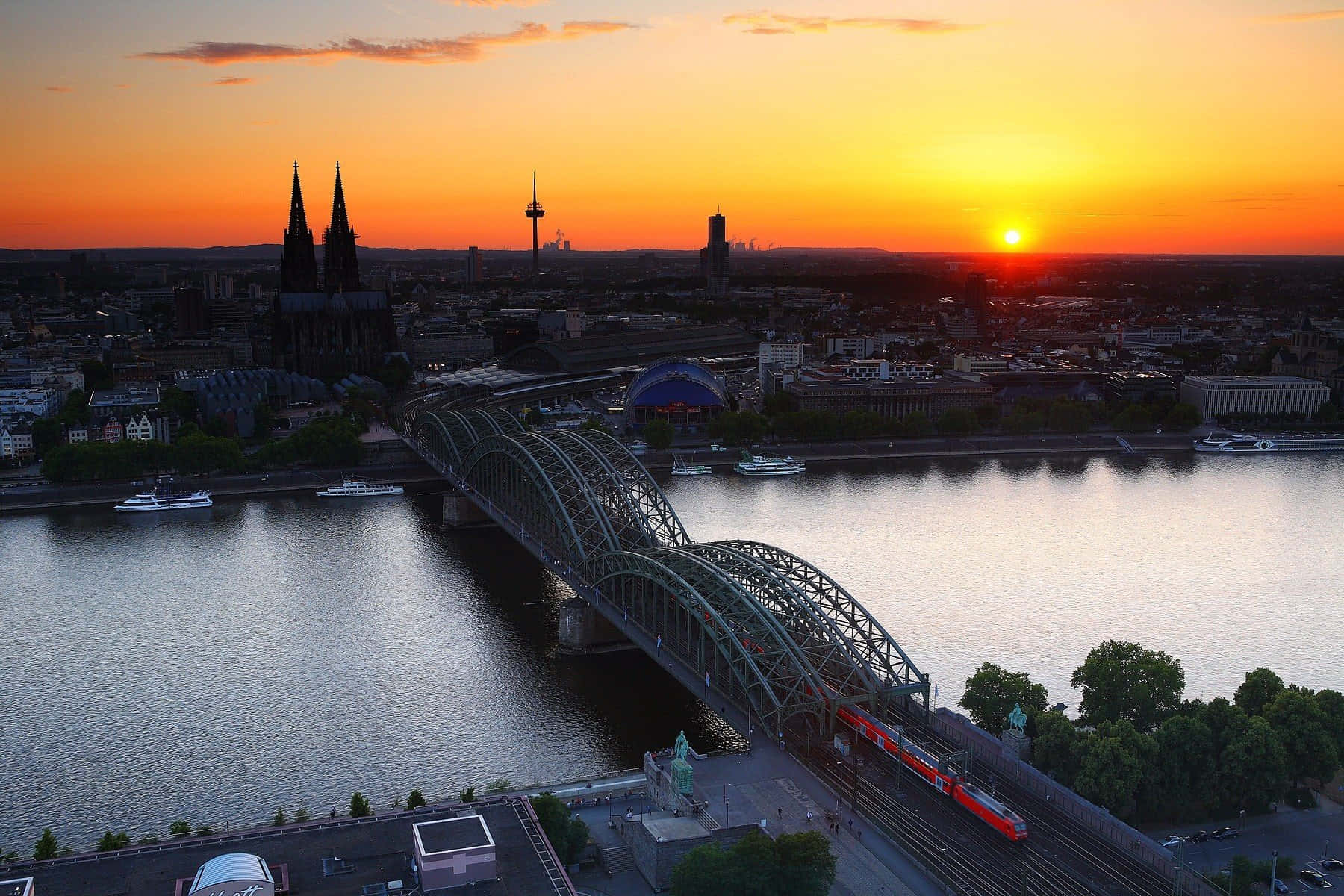 Sunset View With Cologne Cathedral Towers Background