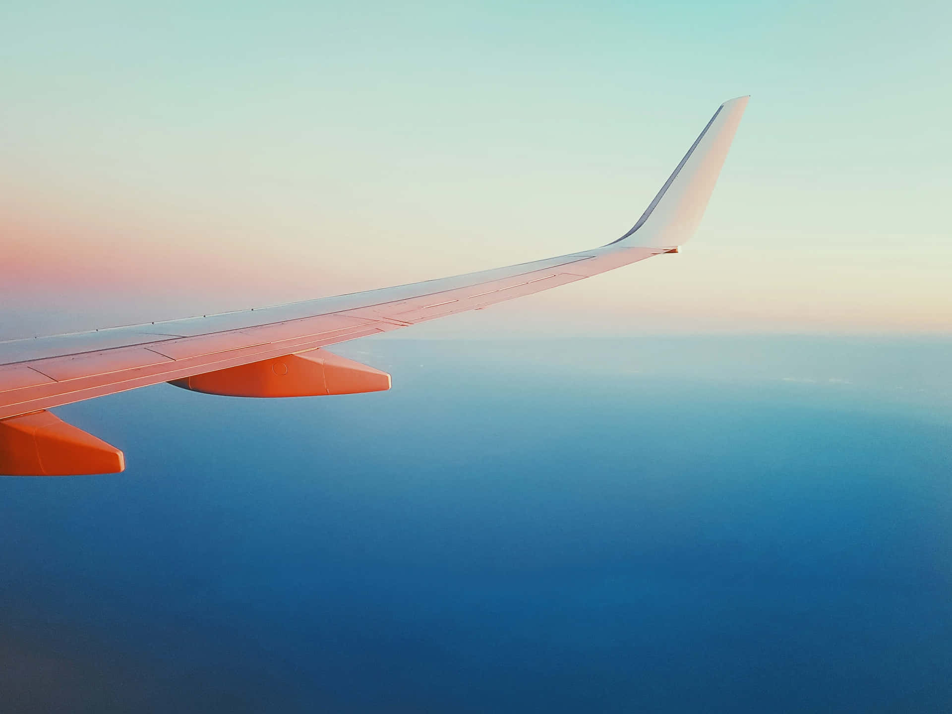 Sunset Wing View Above Clouds Background