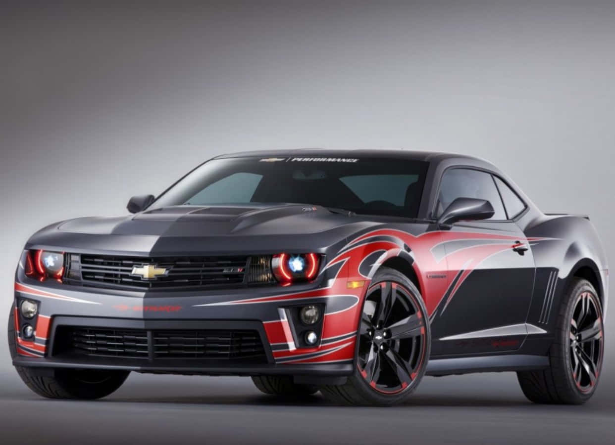 Supercharge Your Style With This Sleek And Speedy Cool Camaro Background
