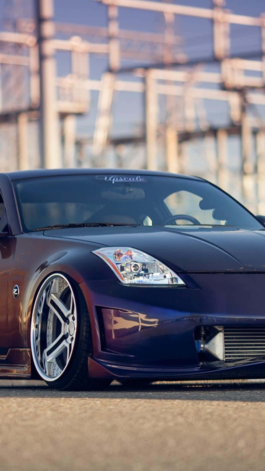 Supercharged Nissan 350z On The Race Track Background