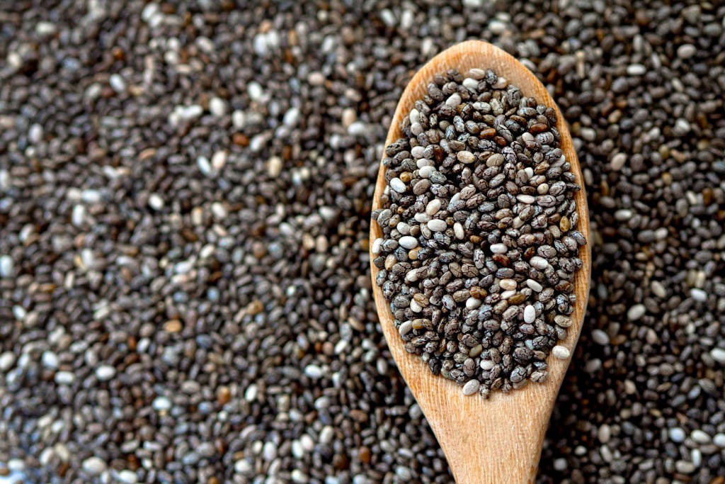 Superfood Spotlight: Scoop Of Chia Seeds Background