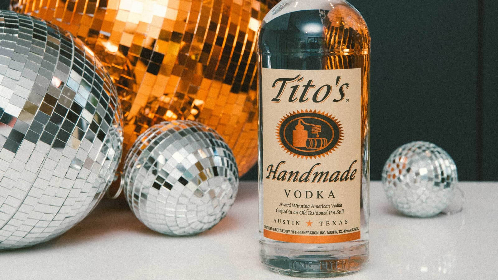 Superior Craftsmanship In Every Bottle - Tito's Vodka Background