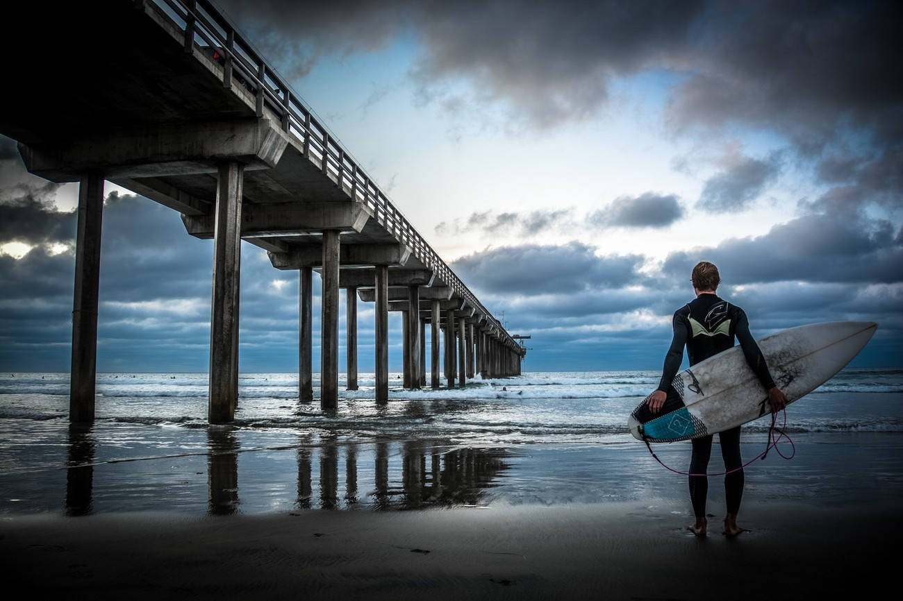 Surfer By The San Diego Pier