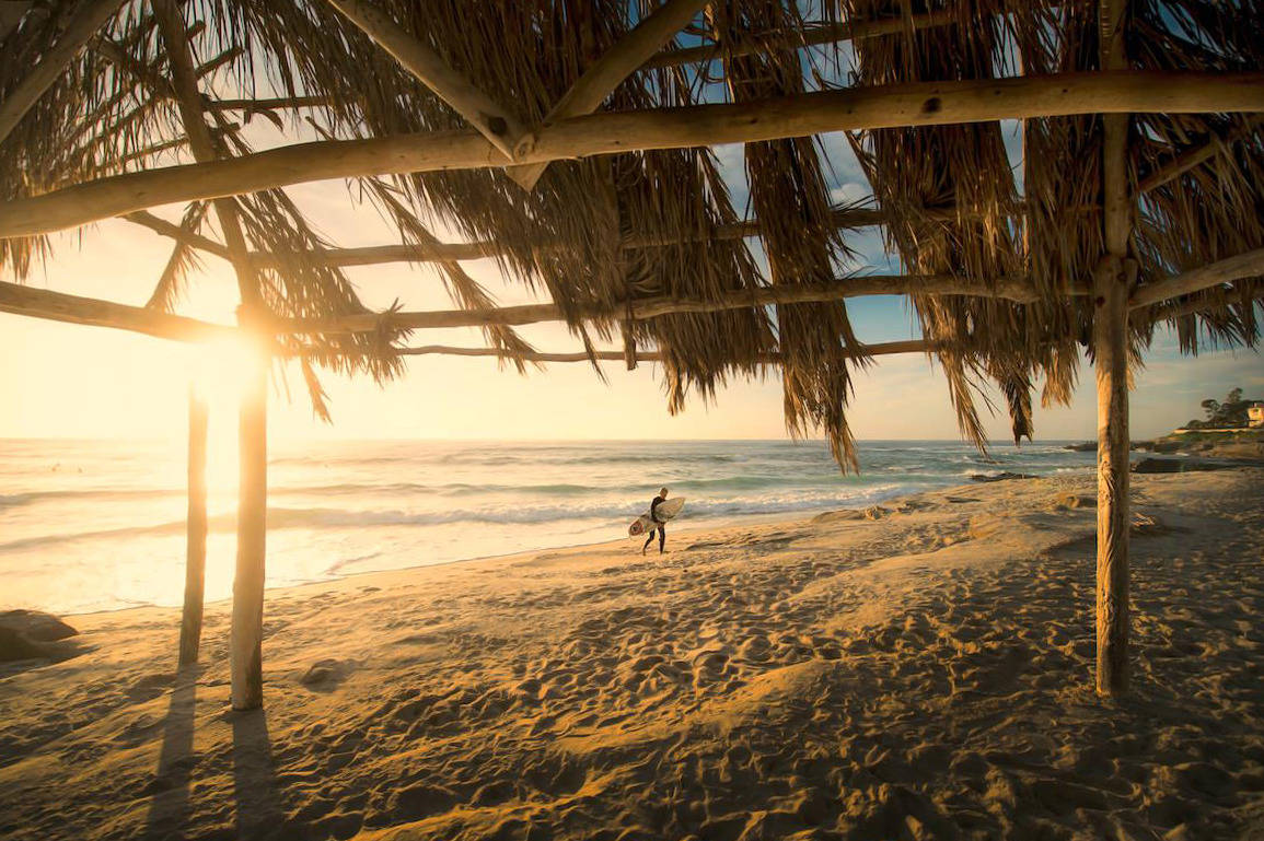 Surfer On San Diego Beach Background