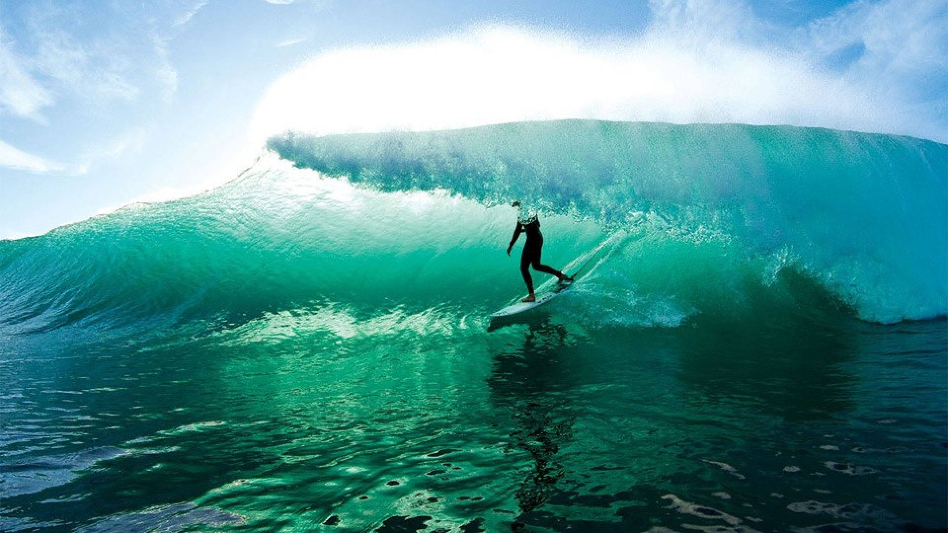 Surfer Under Ocean Waves Background