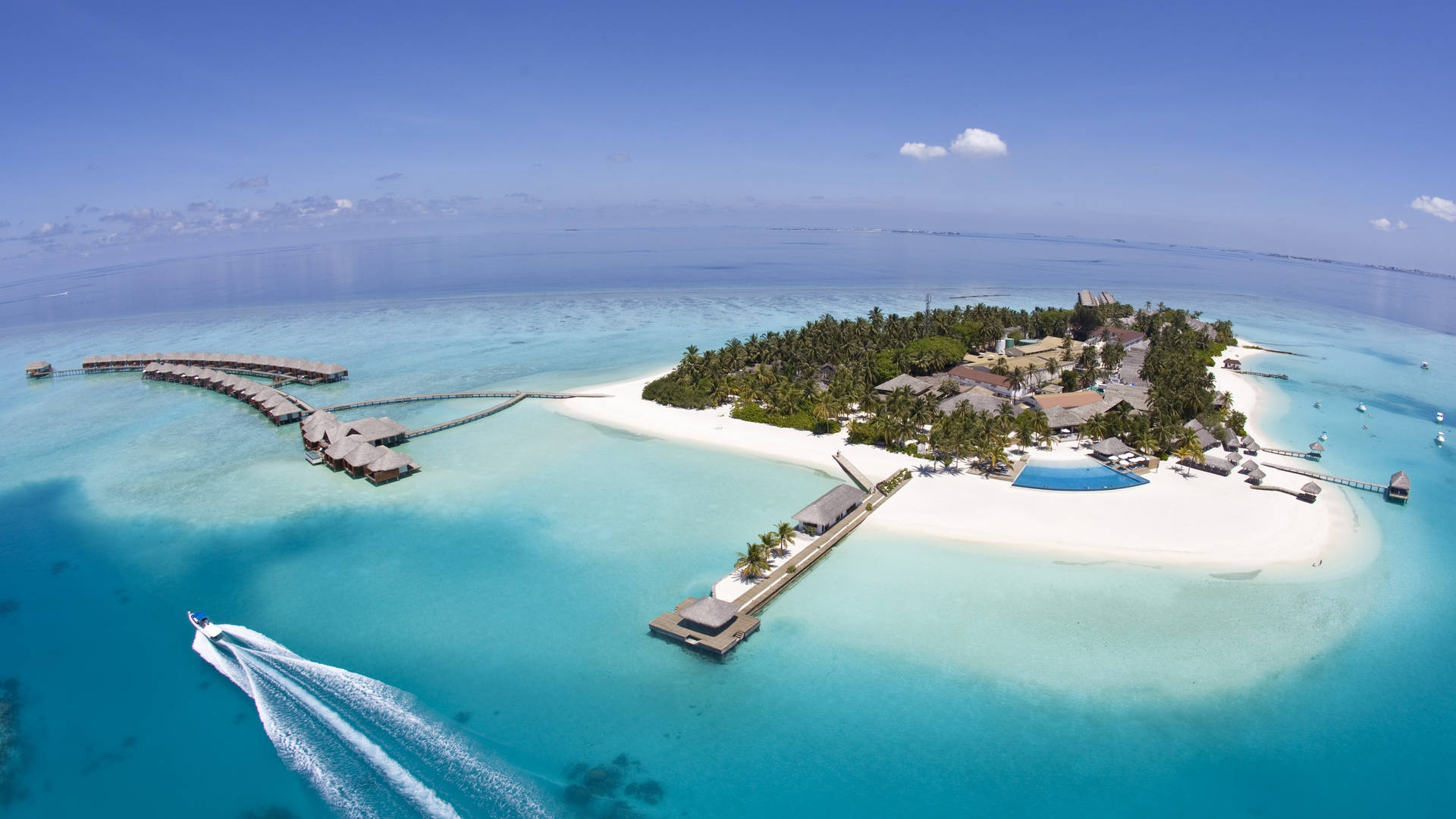 Surreal Serenity: The Pristine White Beaches Of Maldives Background