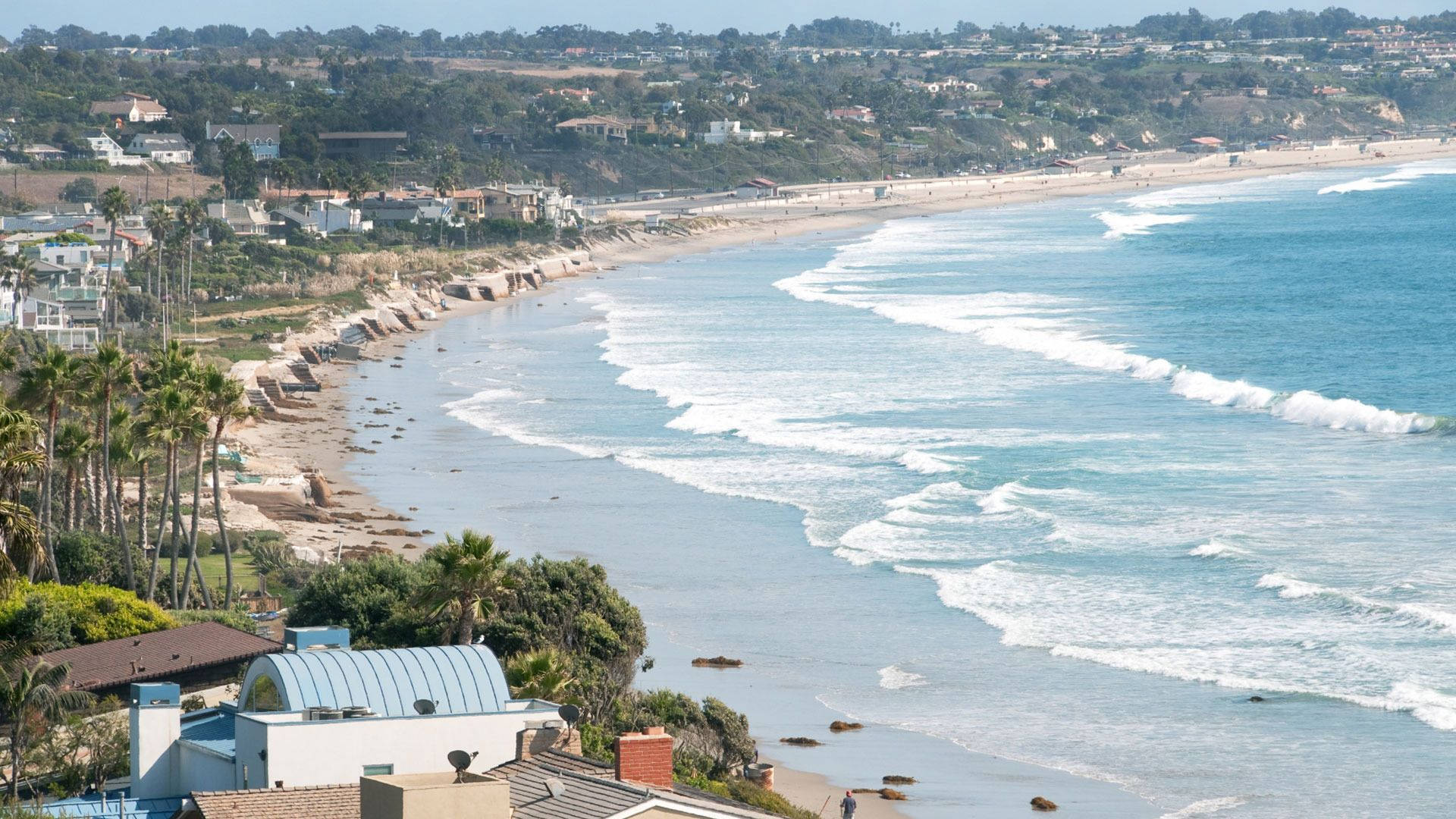 Surrounded By Sandy Beaches And Crystal-clear Waters, Malibu, California Is The Picture Of Paradise. Background