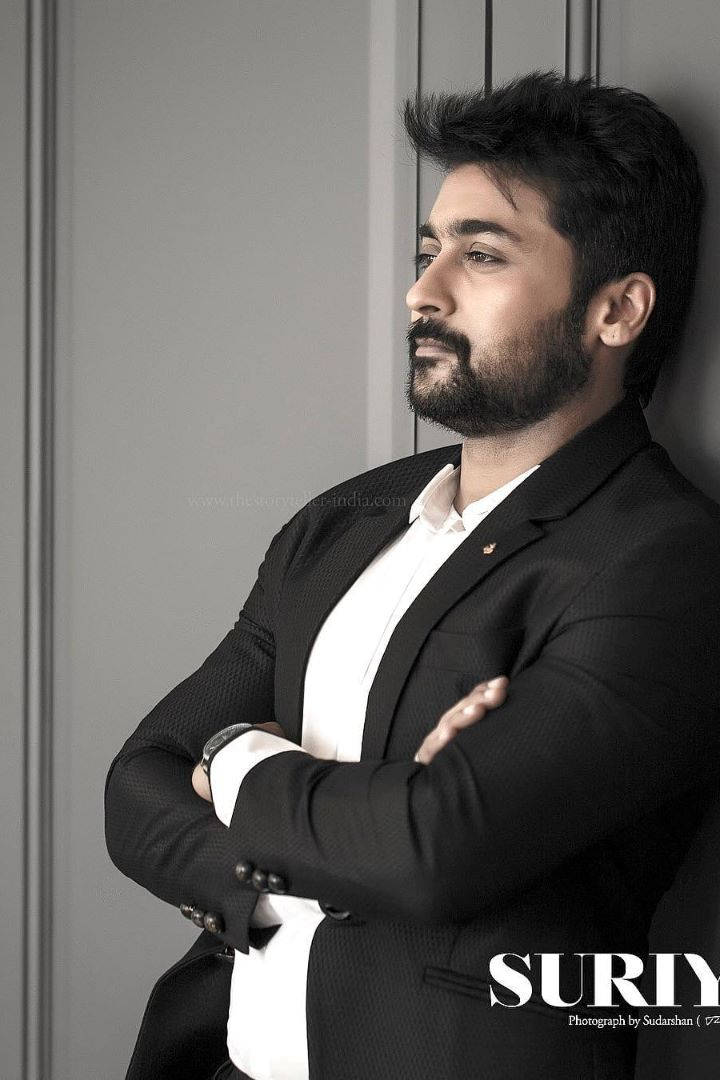 Surya Leaning Against Wall Hd Background