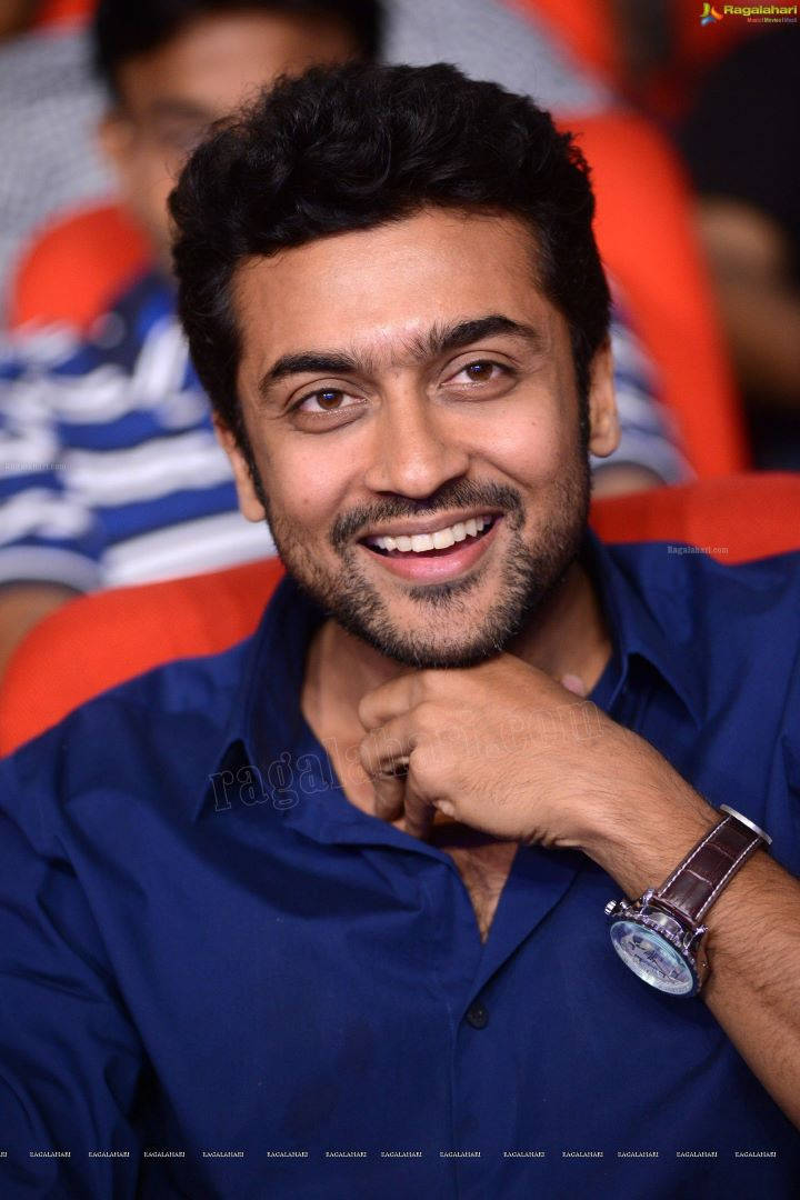 Surya Rubbing His Neck Hd Background