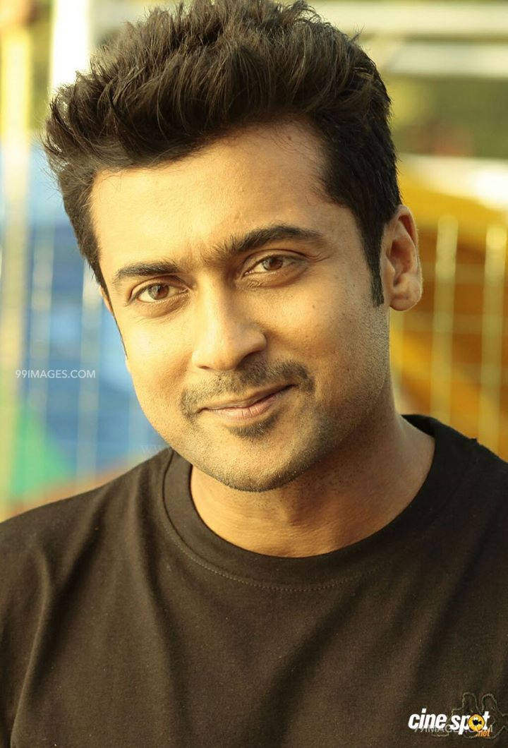 Surya Smirking Hd Background