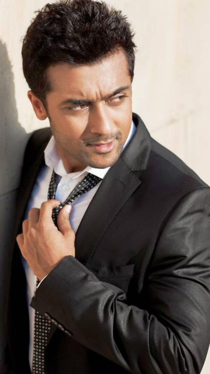 Surya Wearing Tuxedo Hd Background